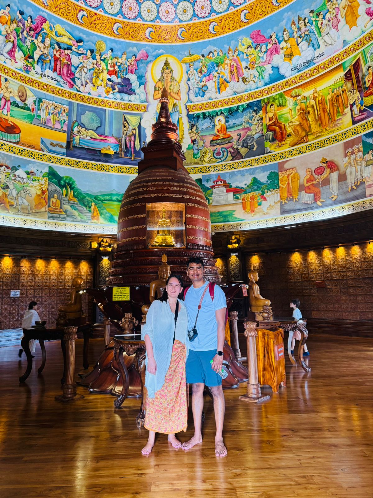 Travelers inside the historic Asgiri Maha Viharaya monastery during a Kandy City Tour